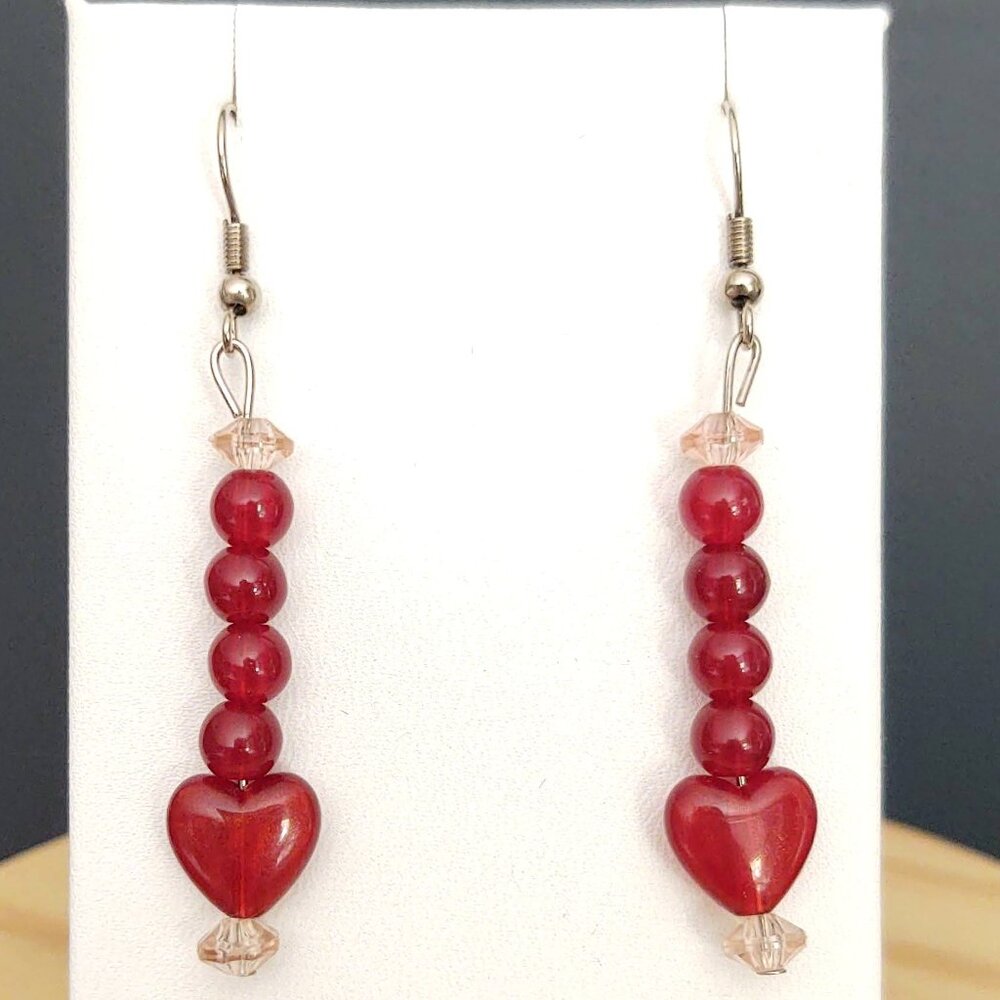 Red beaded heart earrings with pink bead accents